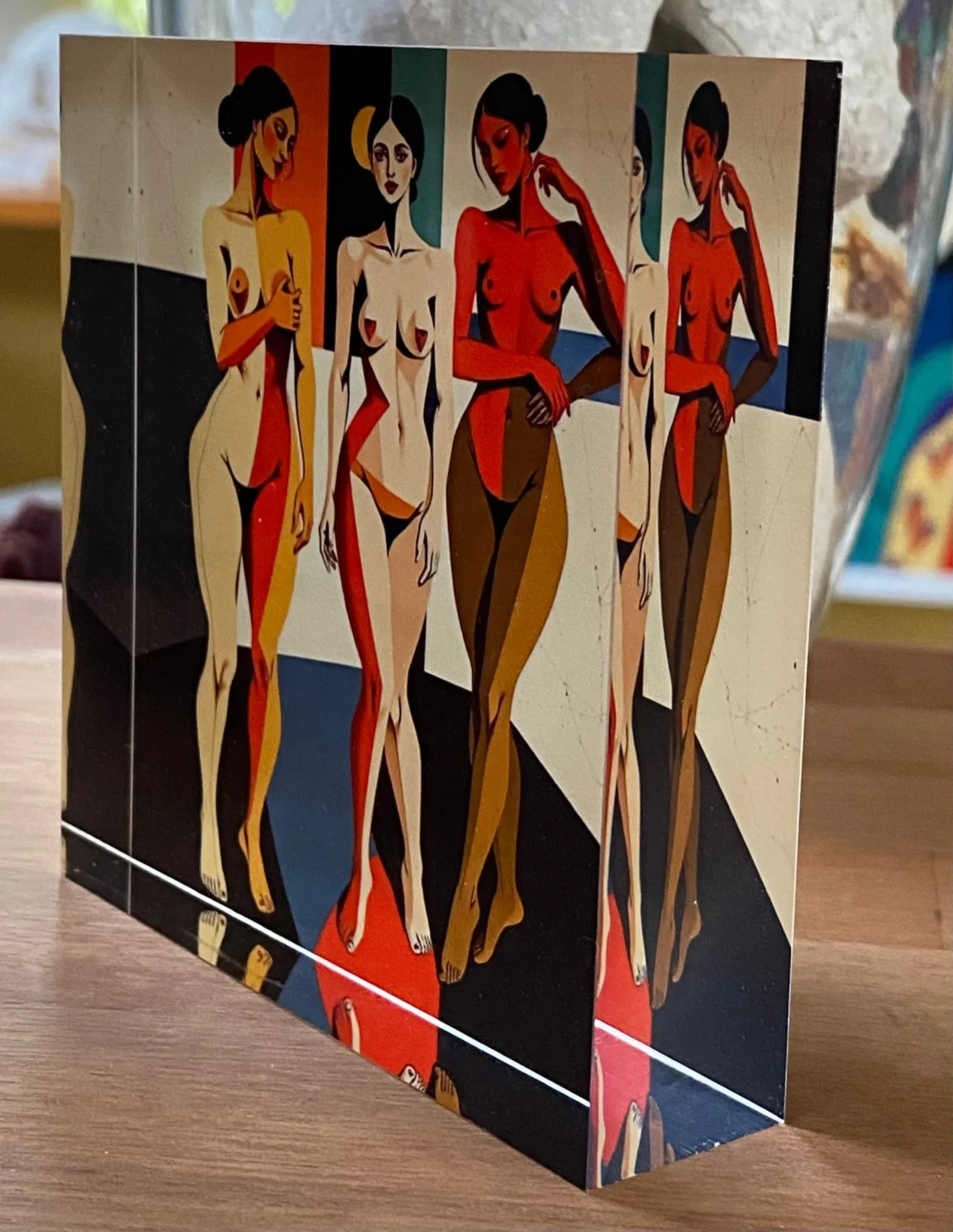 Acrylic block with three women, side view