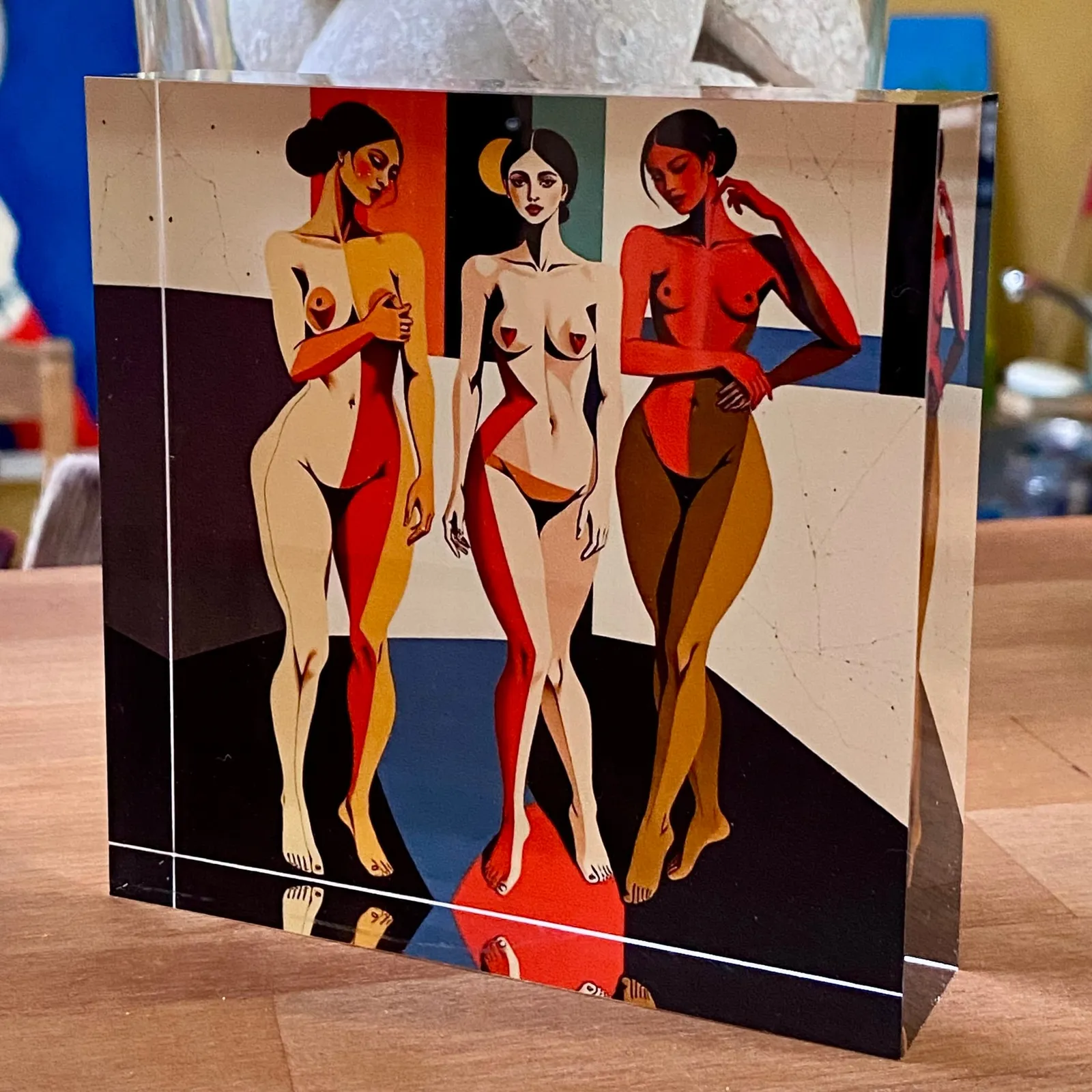 Acrylic block with three women, front view