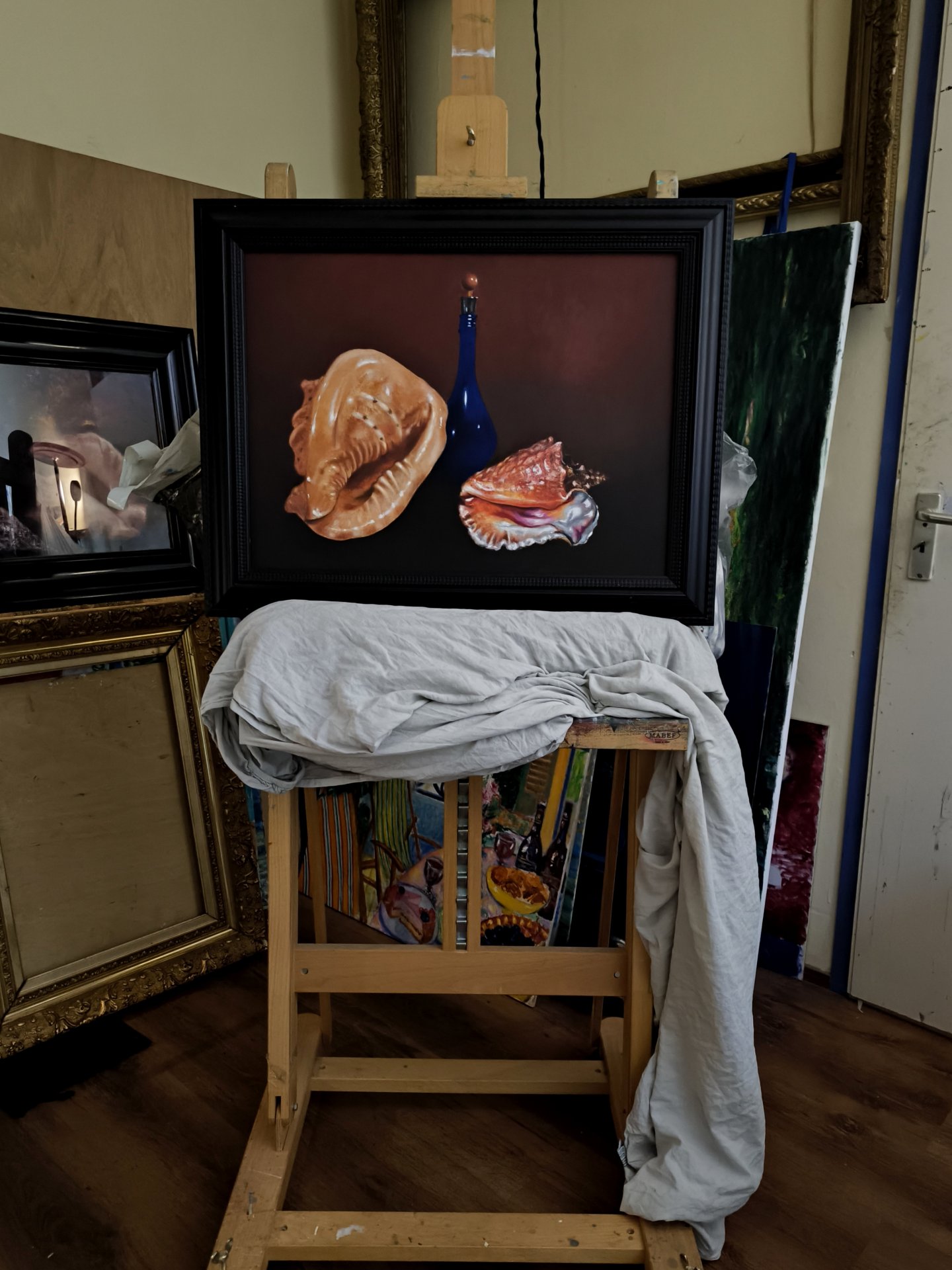 on the easel with frame