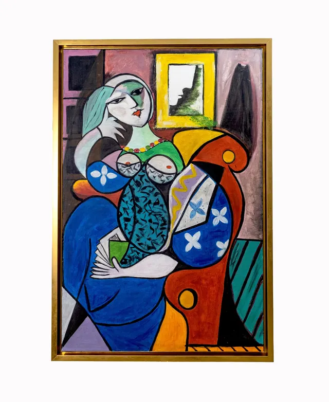 Pablo Picasso”Woman with book “
