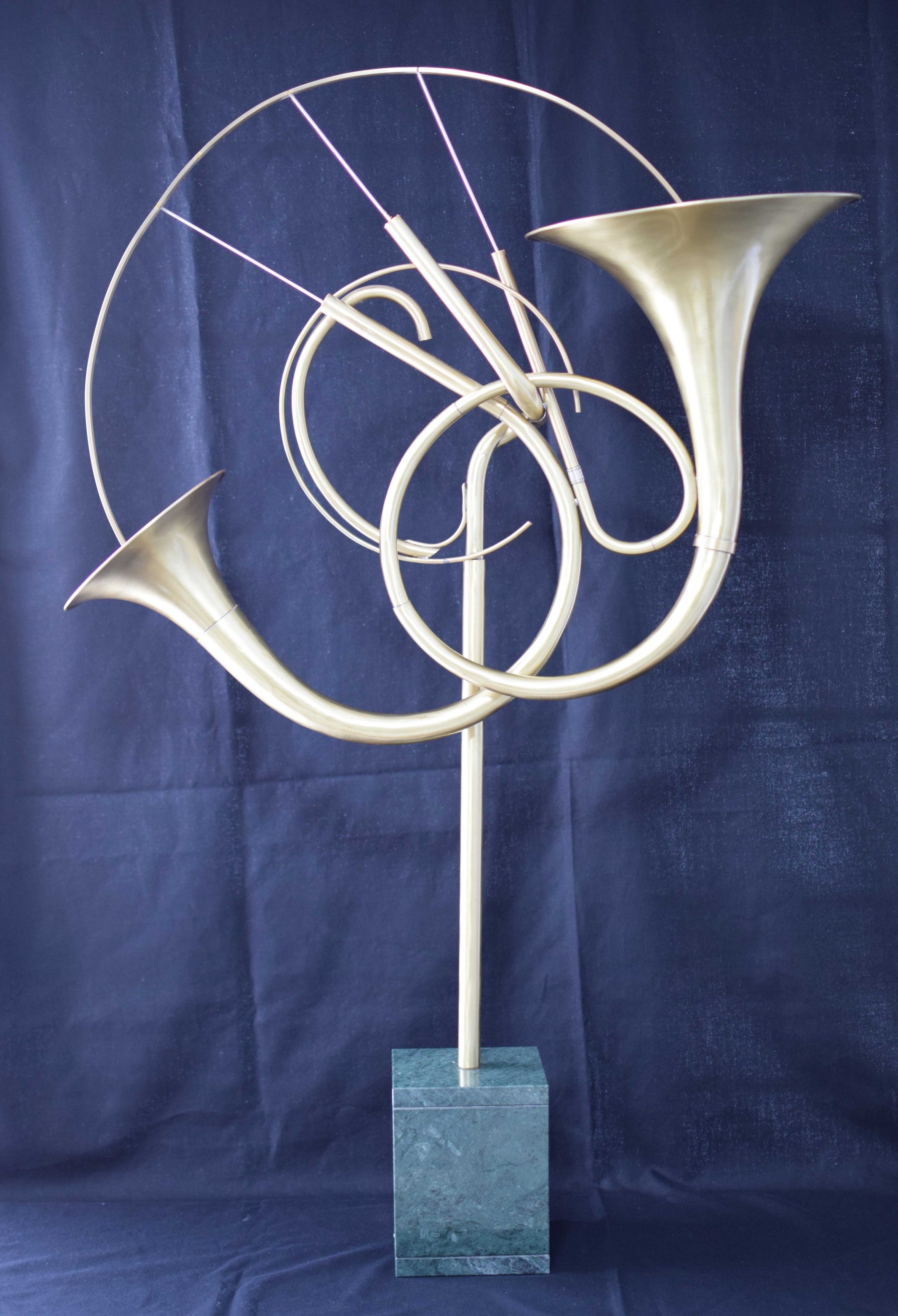 Making a sculpture with brass and music