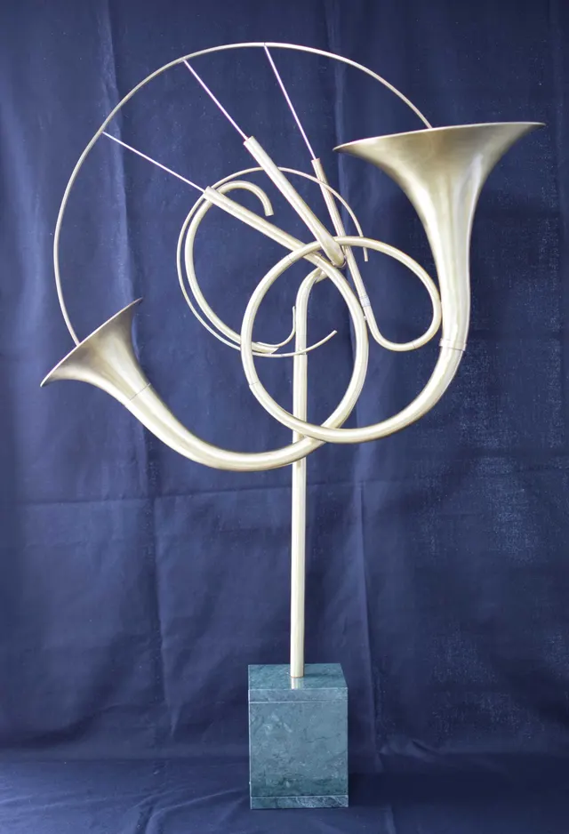 Making a sculpture with brass and music