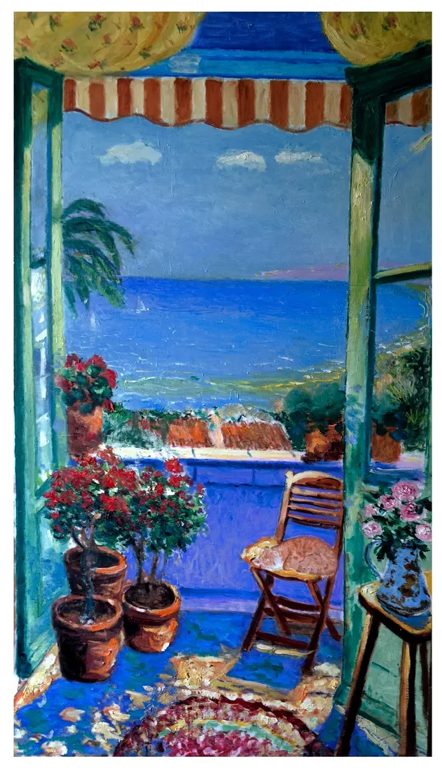 view of the Mediterranean Sea with sleeping cat.