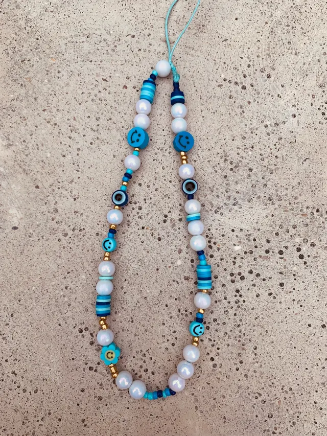 Phonecharm blauw met parels