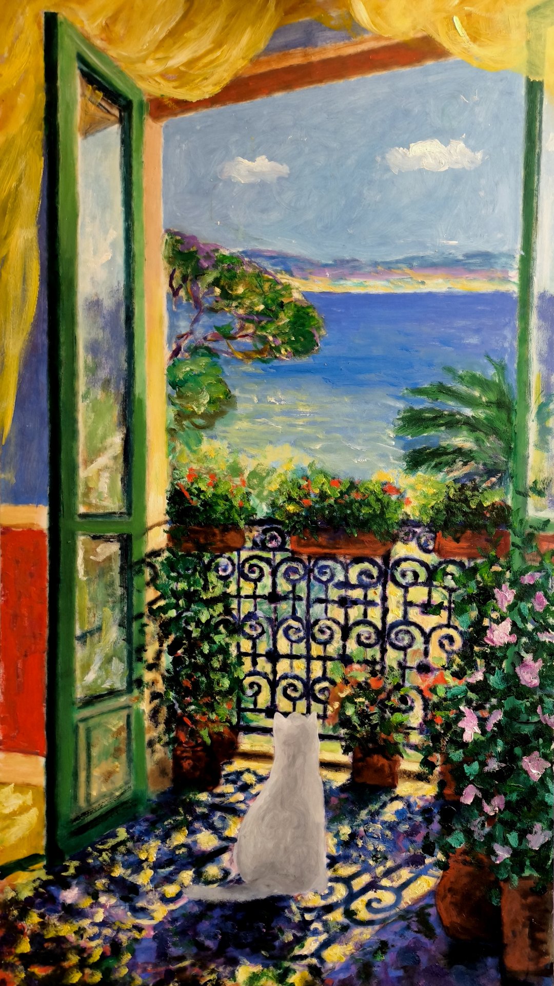 Balcony view with white cat
