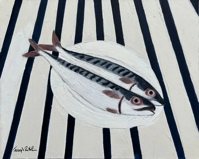 "two mackerels on a plate"