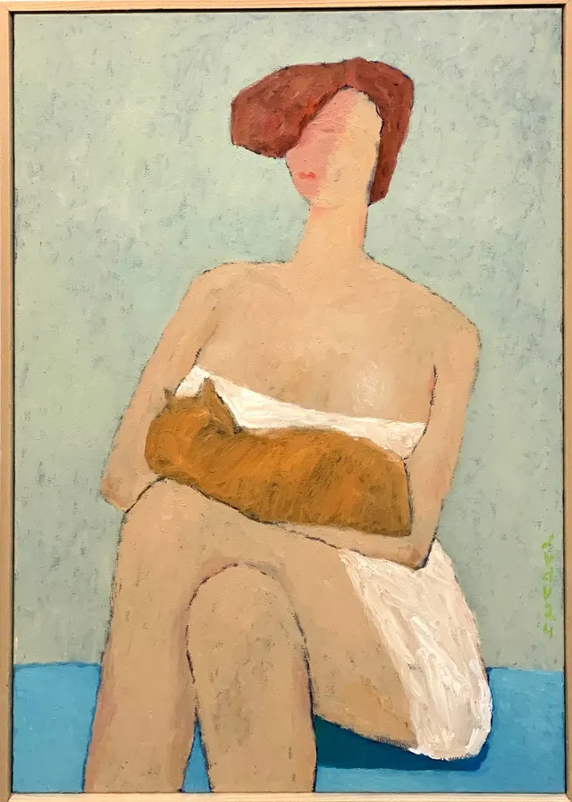 lady and orange cat